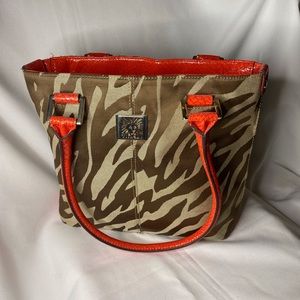 Ann Klein orange, trim, an animal print bag $20